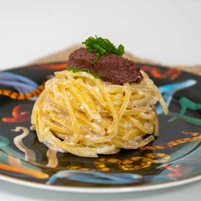 Ricetta Trighetto con fondente di cipollotti e tapenade - La Molisana