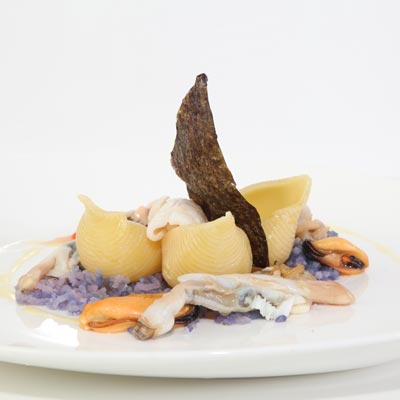 Ricetta Conchiglioni con patate, cozze, vongole, seppioline e calamari