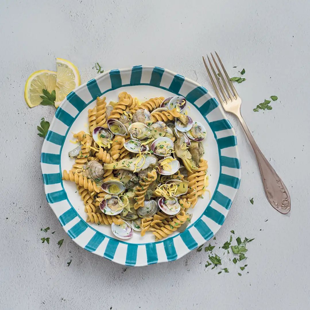 Ricetta Fusilli Integrali con carciofi, vongole lupini e scorza di limone - La Molisana